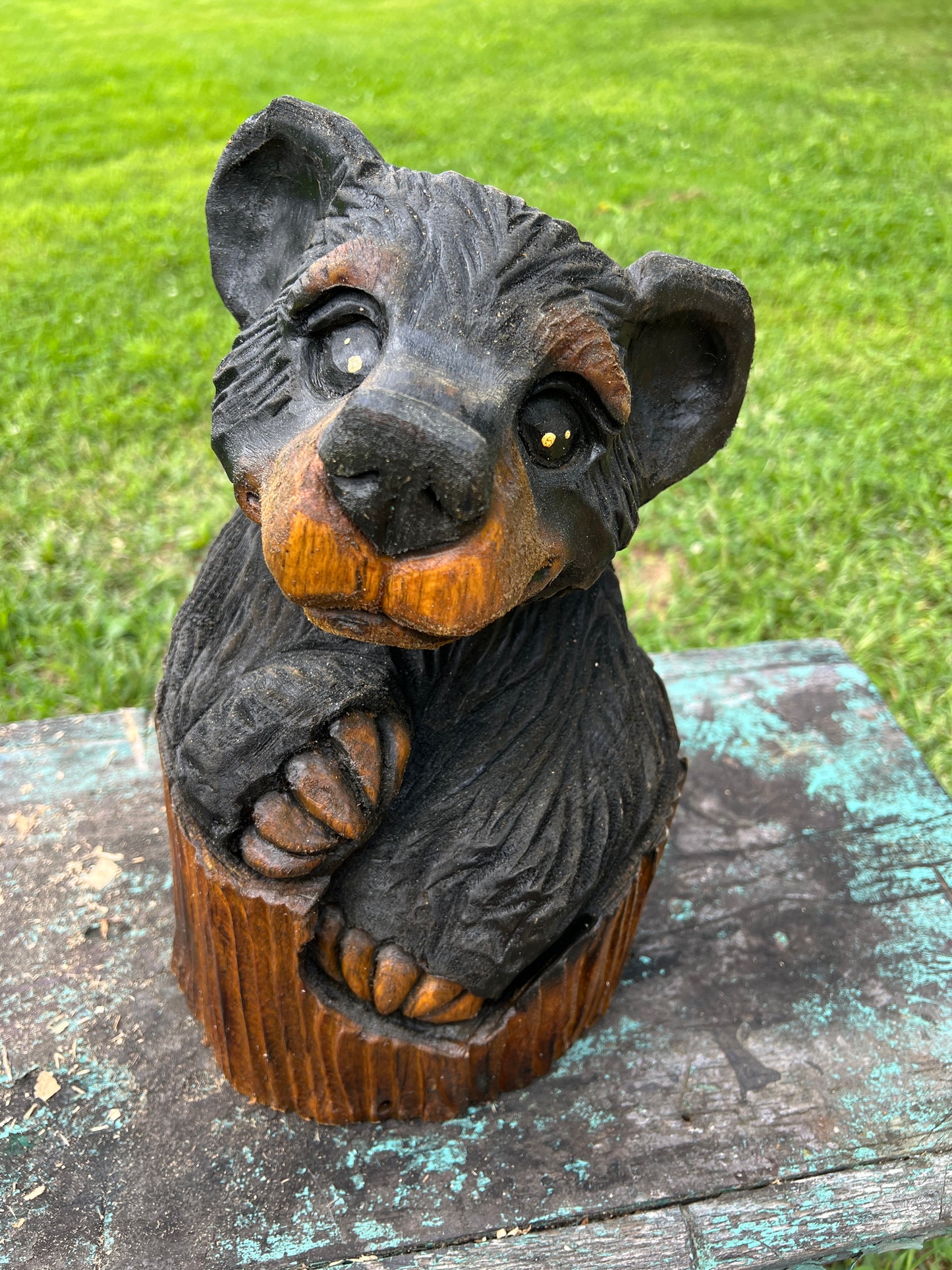 Hand-Carved Bear in Log