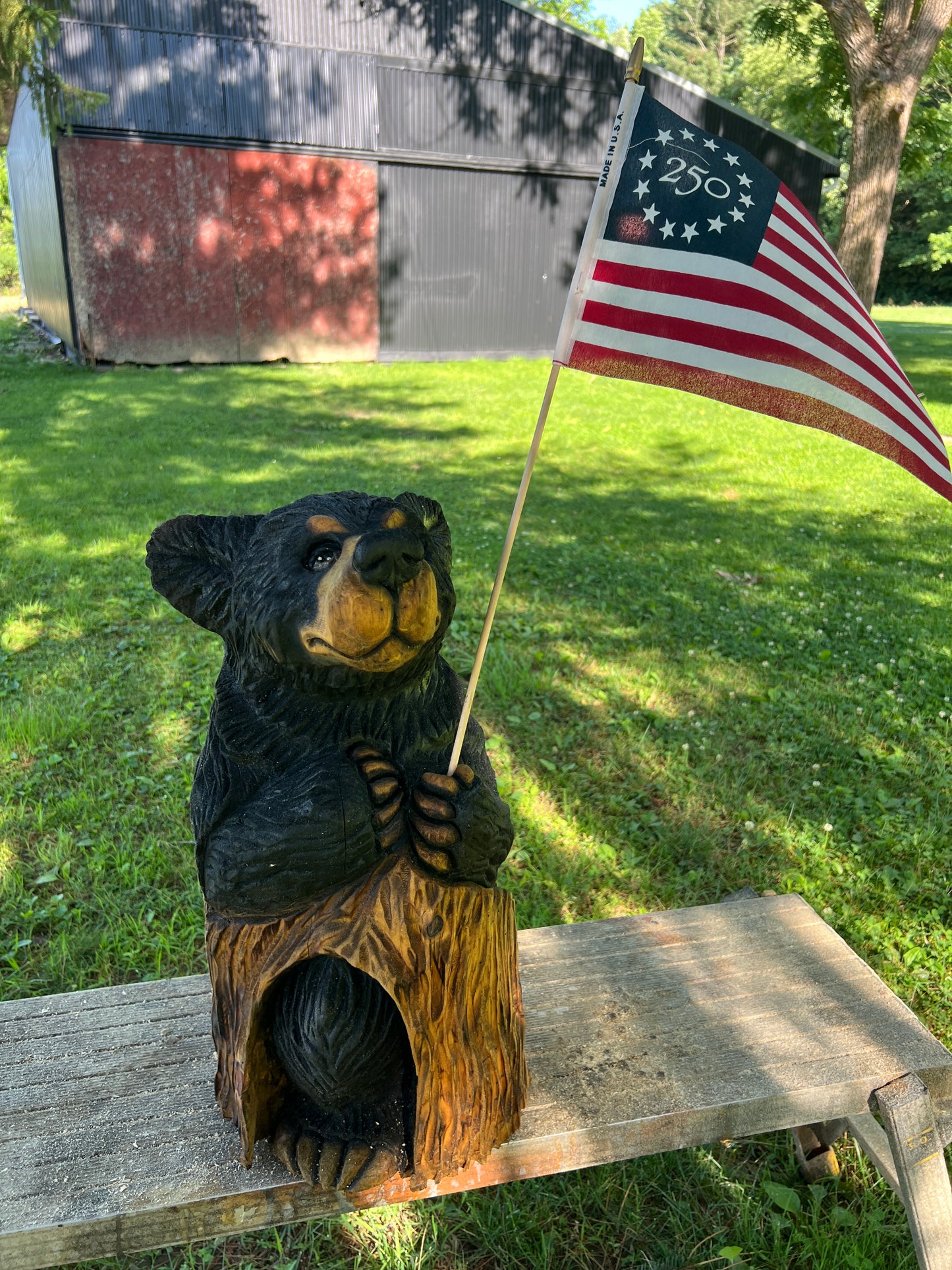 Hand-Carved Black Bear Cub on Stump with American Flag