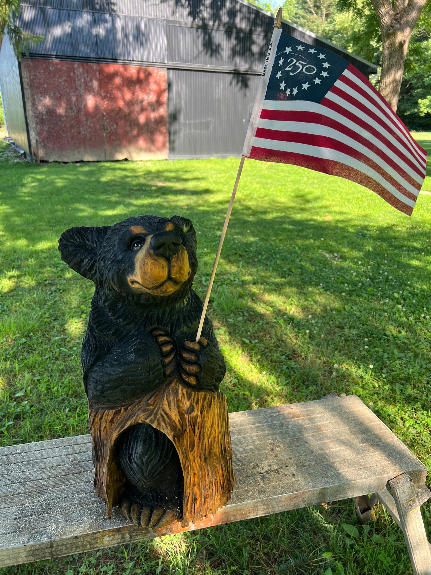 Hand-Carved Black Bear Cub on Stump with American Flag