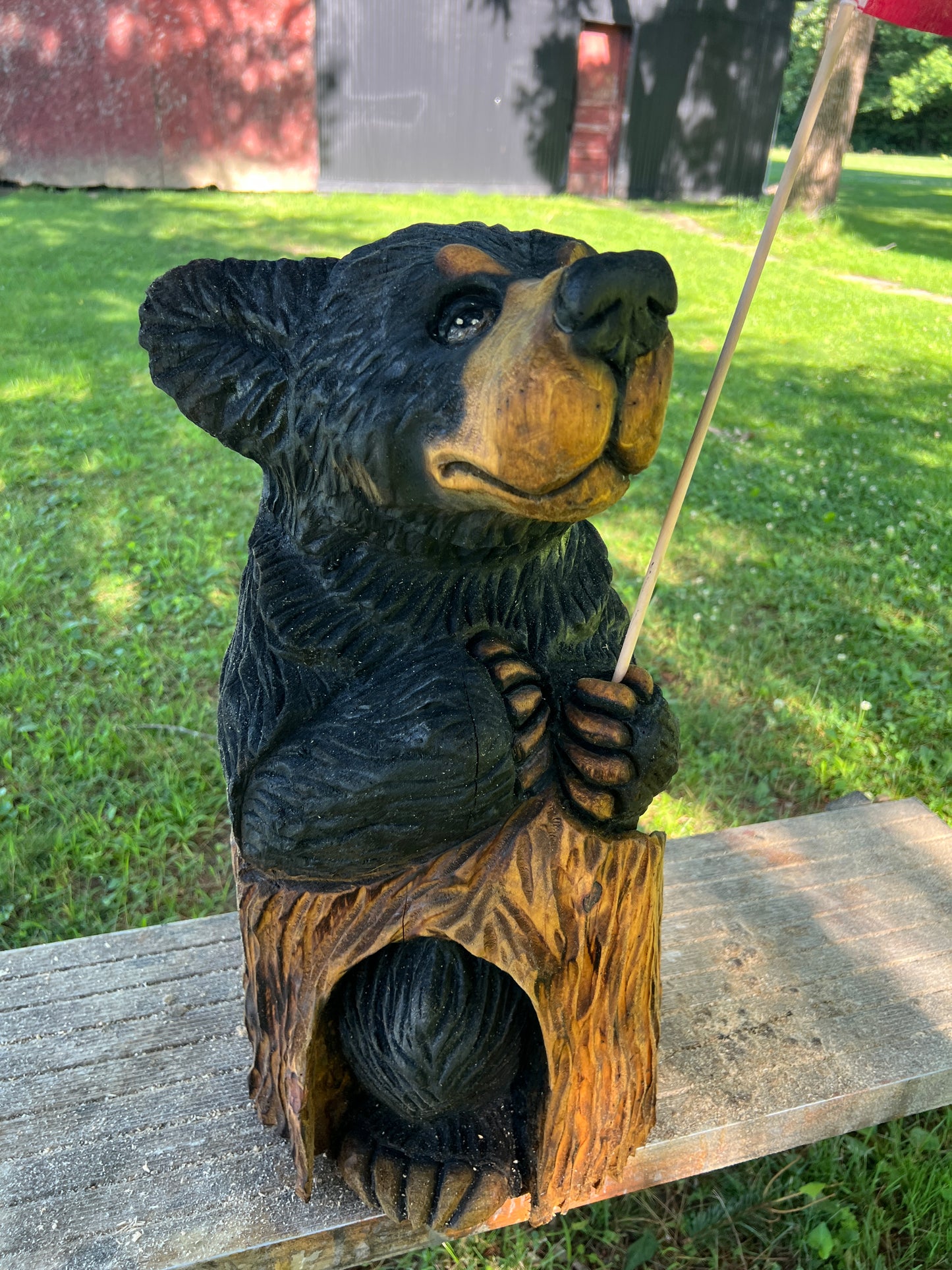 Hand-Carved Black Bear Cub on Stump with American Flag