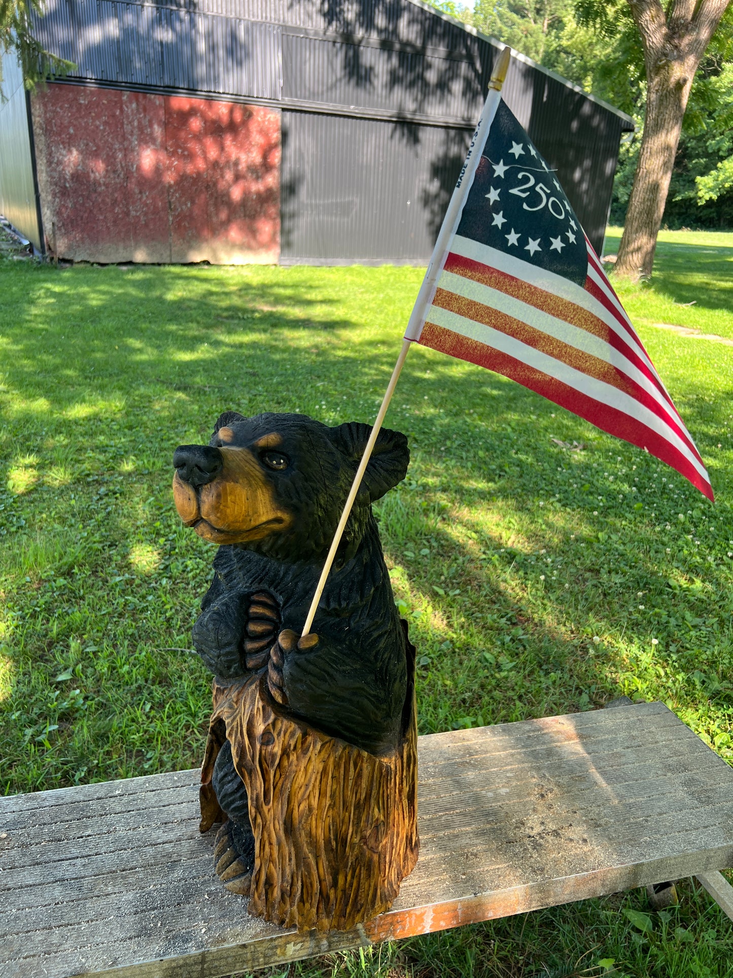Hand-Carved Black Bear Cub on Stump with American Flag